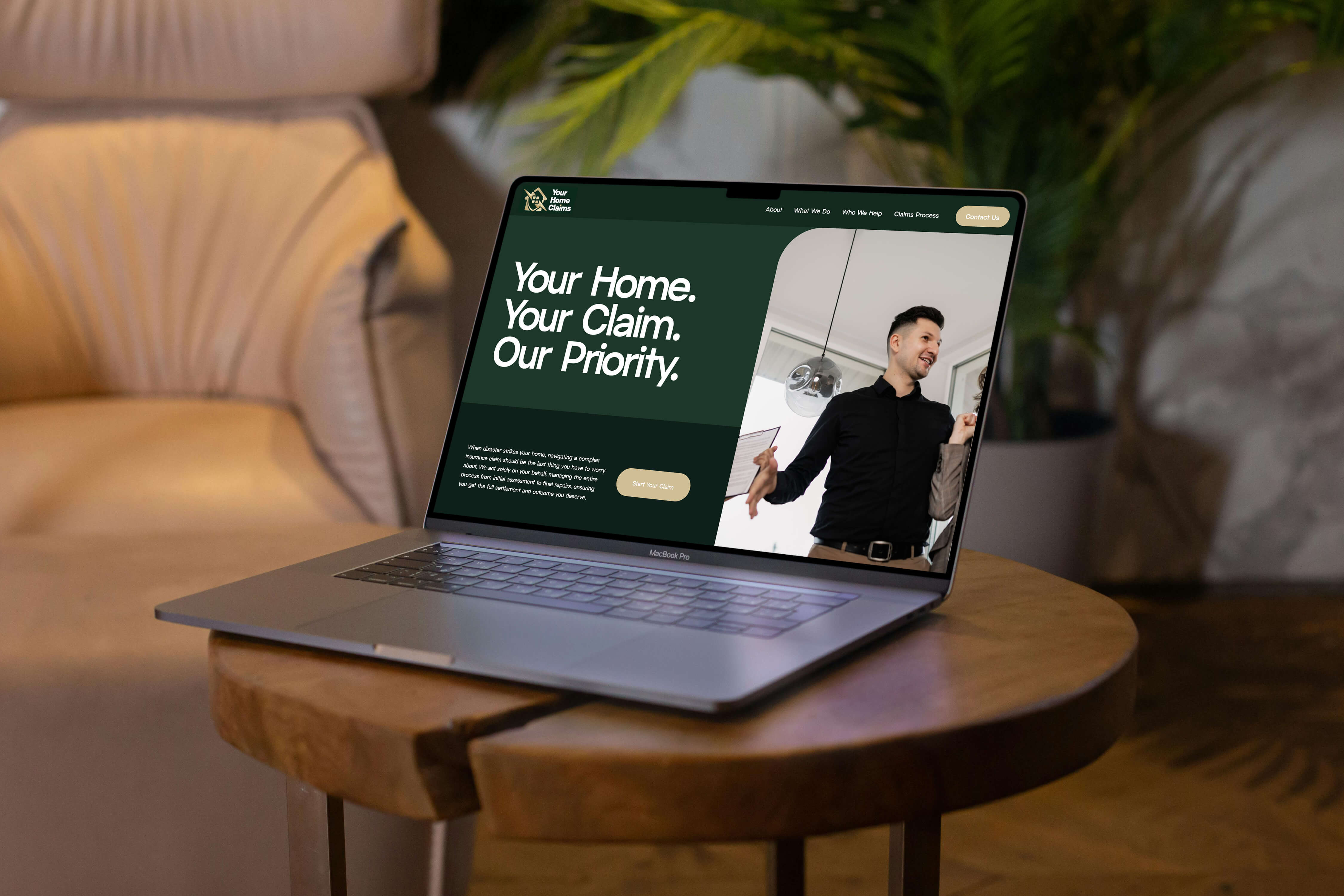 Website on a laptop on top of a wooden table